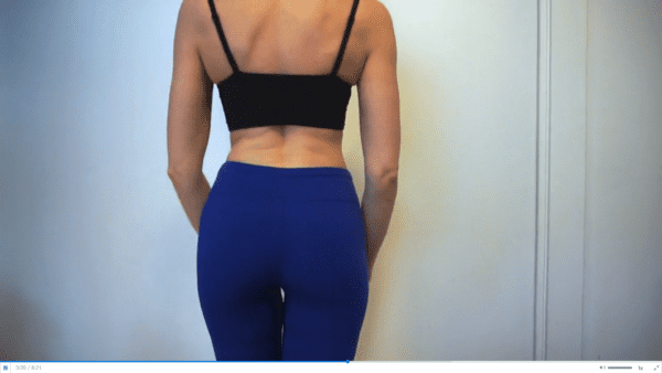 woman wearing black bra and blue yoga pants in panty try on