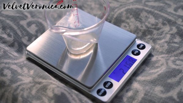 cup of cum on a measuring scale